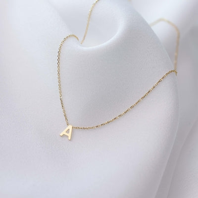 9-karat gold necklace || featuring a personalized initial
